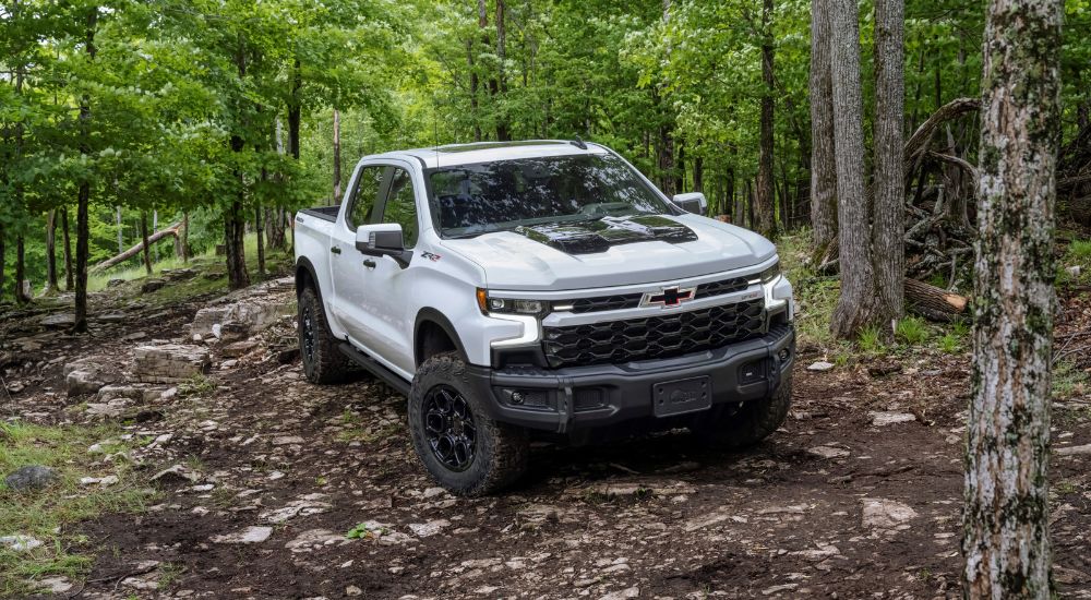 White 2023 Chevy Silverado ZR2 Bison parked off-road