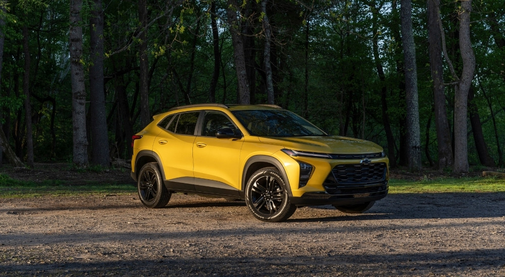 Yellow 2024 Chevy Trax ACTIV parked off-road