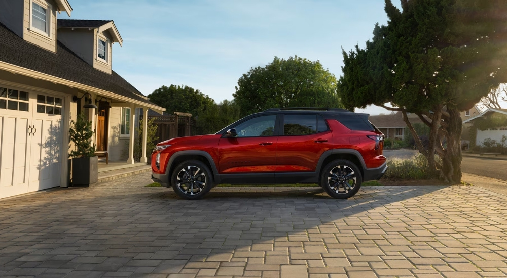 Red 2026 Chevy Equinox parked on a driveway