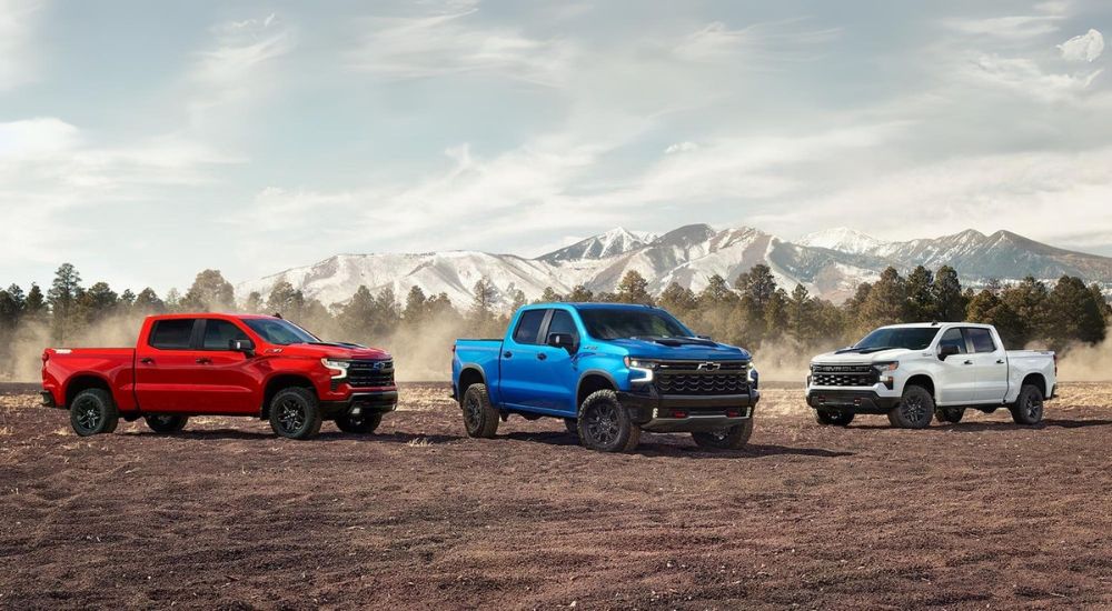 Trio of 2026 Chevy Silverado 1500s parked side by side