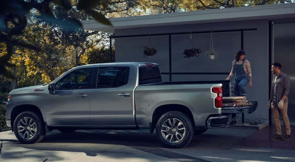 A silver 2025 Chevy Silverado 1500 Z71 parked on a driveway.