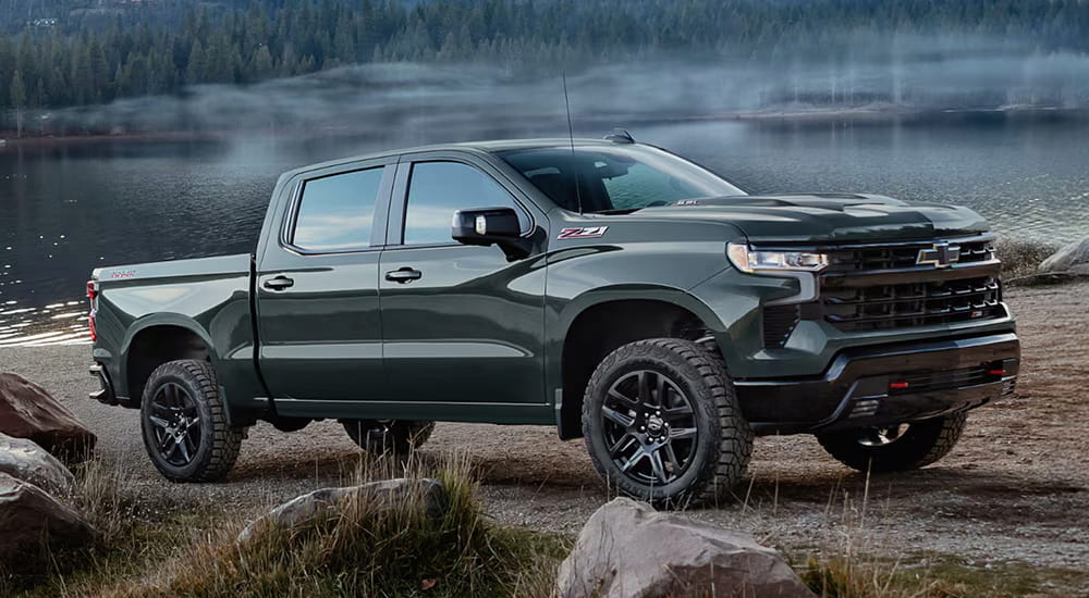 Grey 2026 Chevy Silverado 1500 driving off-road.