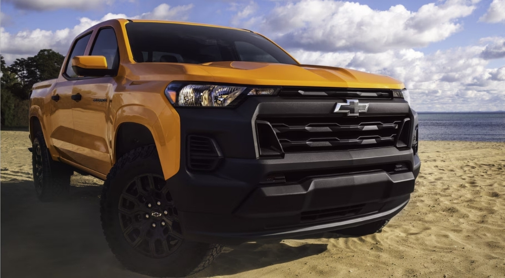 Yellow 2026 Chevy Colorado for sale in Birmingham parked near a lake