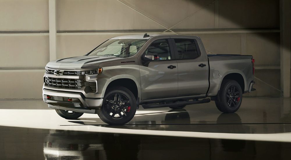 Silver 2026 Chevy Silverado 1500 Redline for sale parked in a garage