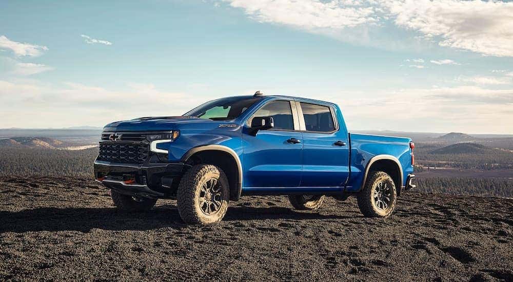 A blue 2024 ZR2, a Chevy Silverado for sale near Bessemer, off-roading.