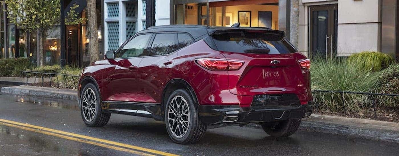 A red 2023 Chevy Blazer RS is shown from the rear at an angle.