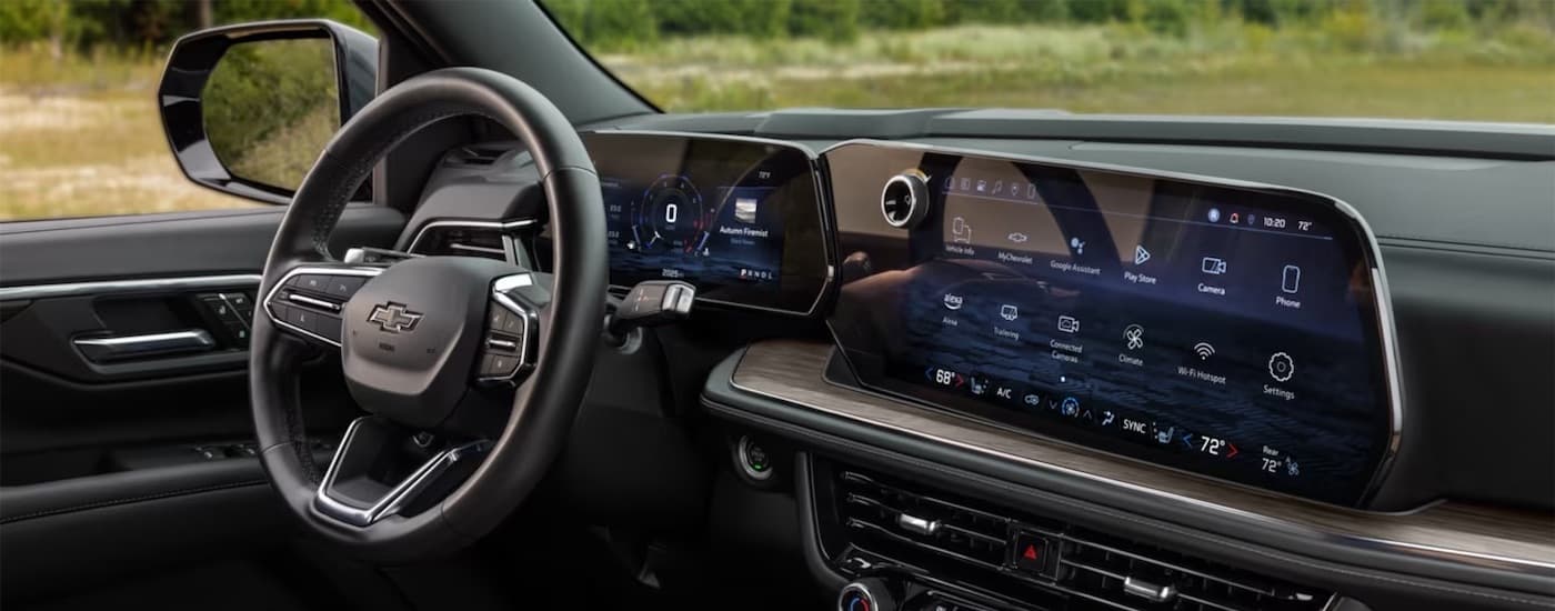 The interior of the front seat of a 2026 Chevy Tahoe.