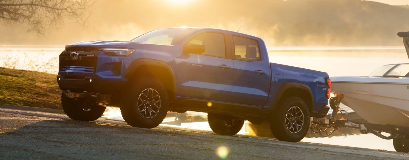 Blue 2026 Chevy Colorado ZR2 towing a boat