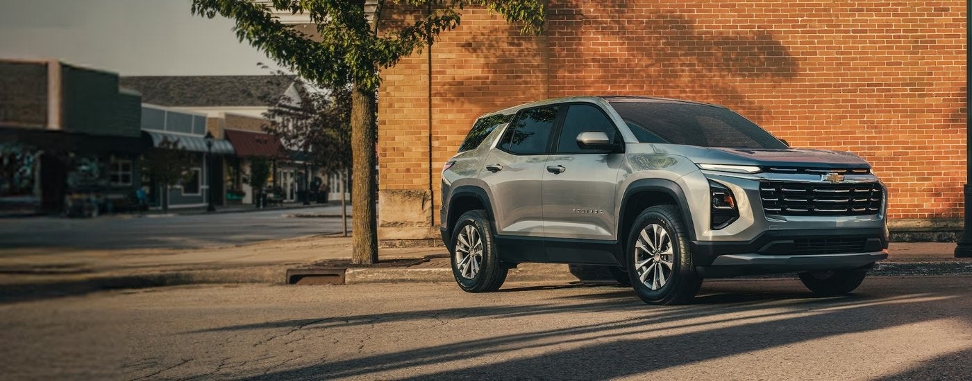 Silver 2026 Chevy Equinox parked in a city