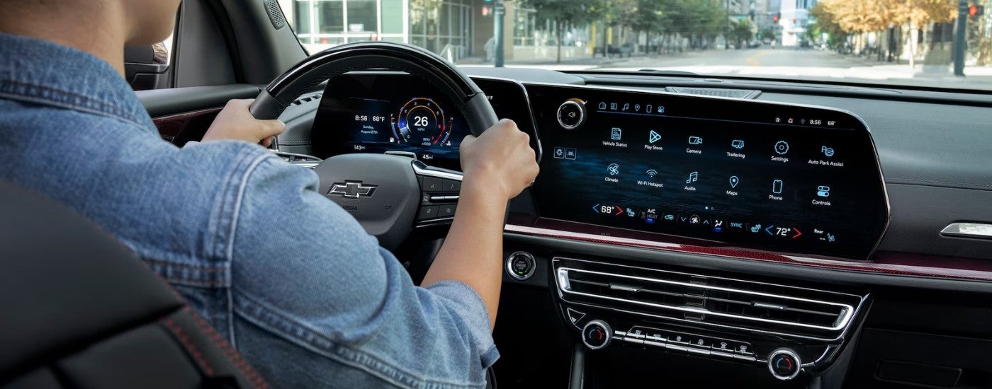 Person steering a 2026 Chevy Traverse
