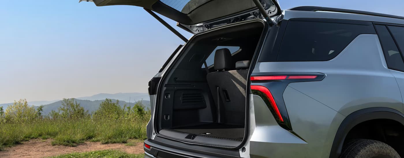 Open rear liftgate on a grey 2026 Chevy Traverse