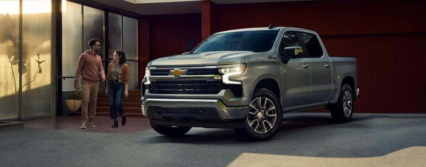 A silver 2022 Chevy Silverado 1500 Z71 for sale near Trussville, AL is shown parked in a driveway.
