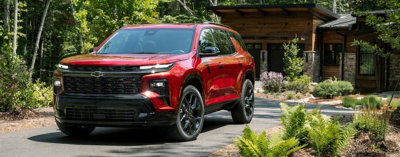 Red 2024 Chevy Traverse RS parked on a driveway