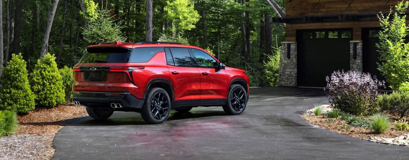 Red 2025 Chevy Traverse RS parked on a driveway