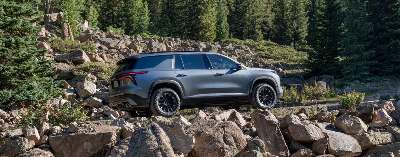 Silver 2025 Chevy Traverse for sale off-roading