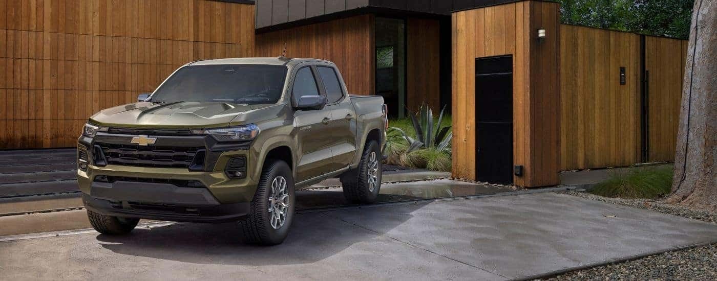 A green 2024 Chevy Colorado is shown parked after viewing trucks for sale near Gardendale.
