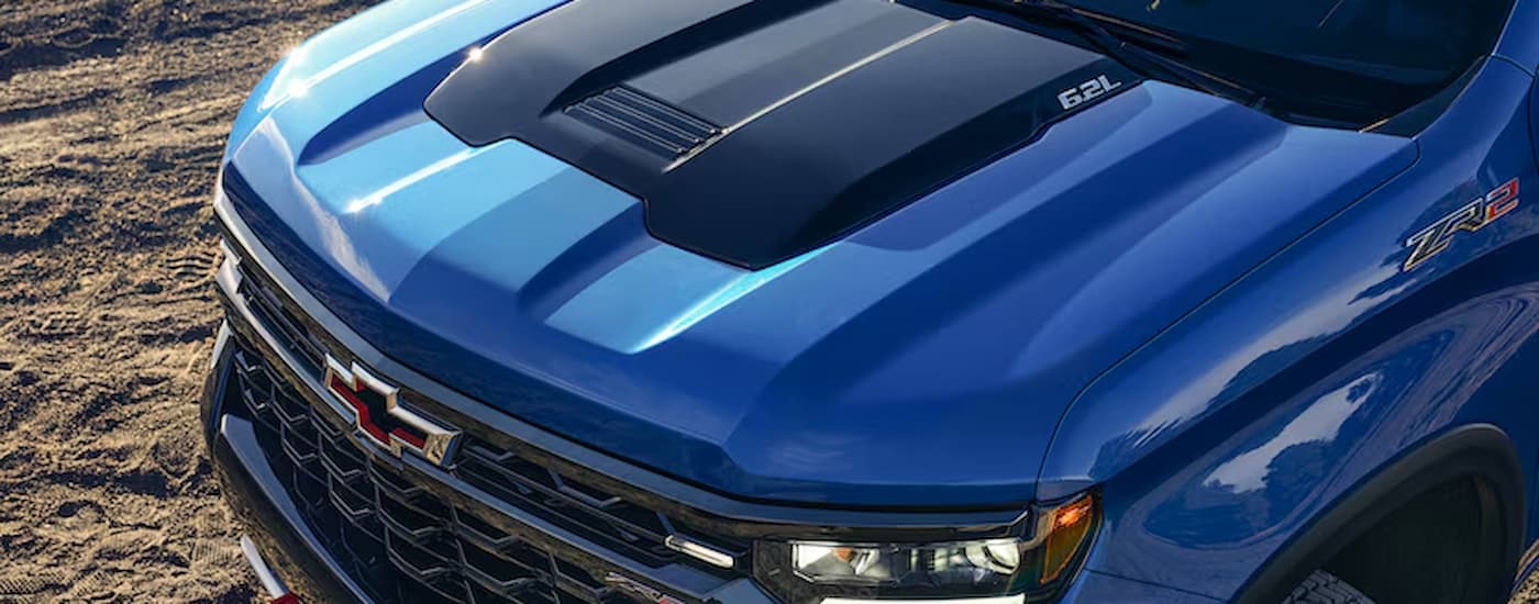 The hood of a blue 2026 Chevy Silverado 1500 ZR2 